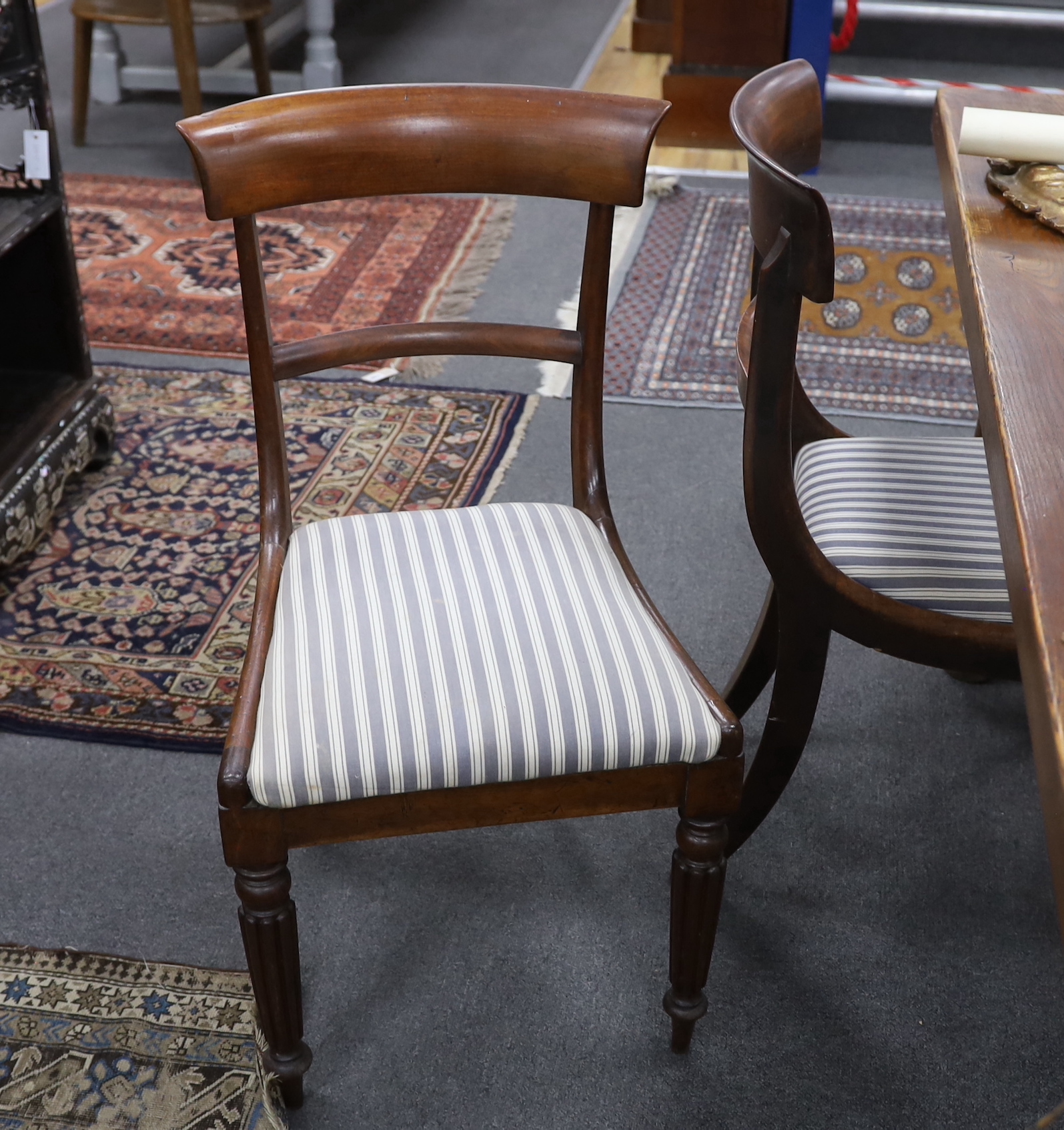 Six (three pairs) William IV mahogany and simulated rosewood dining chairs